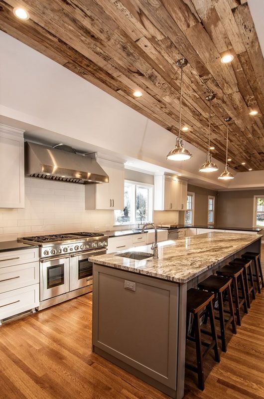 custom kitchen remodel featuring wood panels