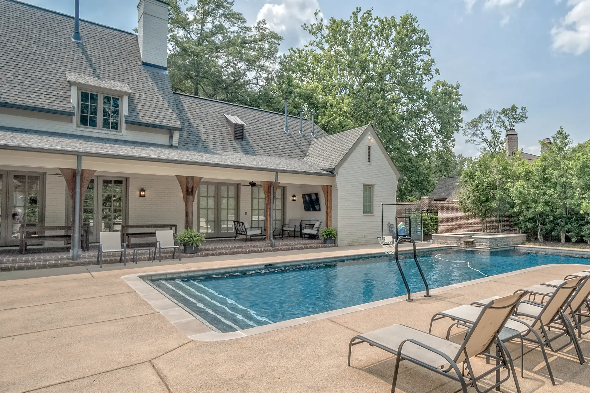 Home construction showing custom pool.